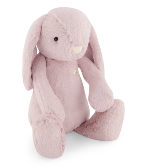 Lapin en peluche rose doux